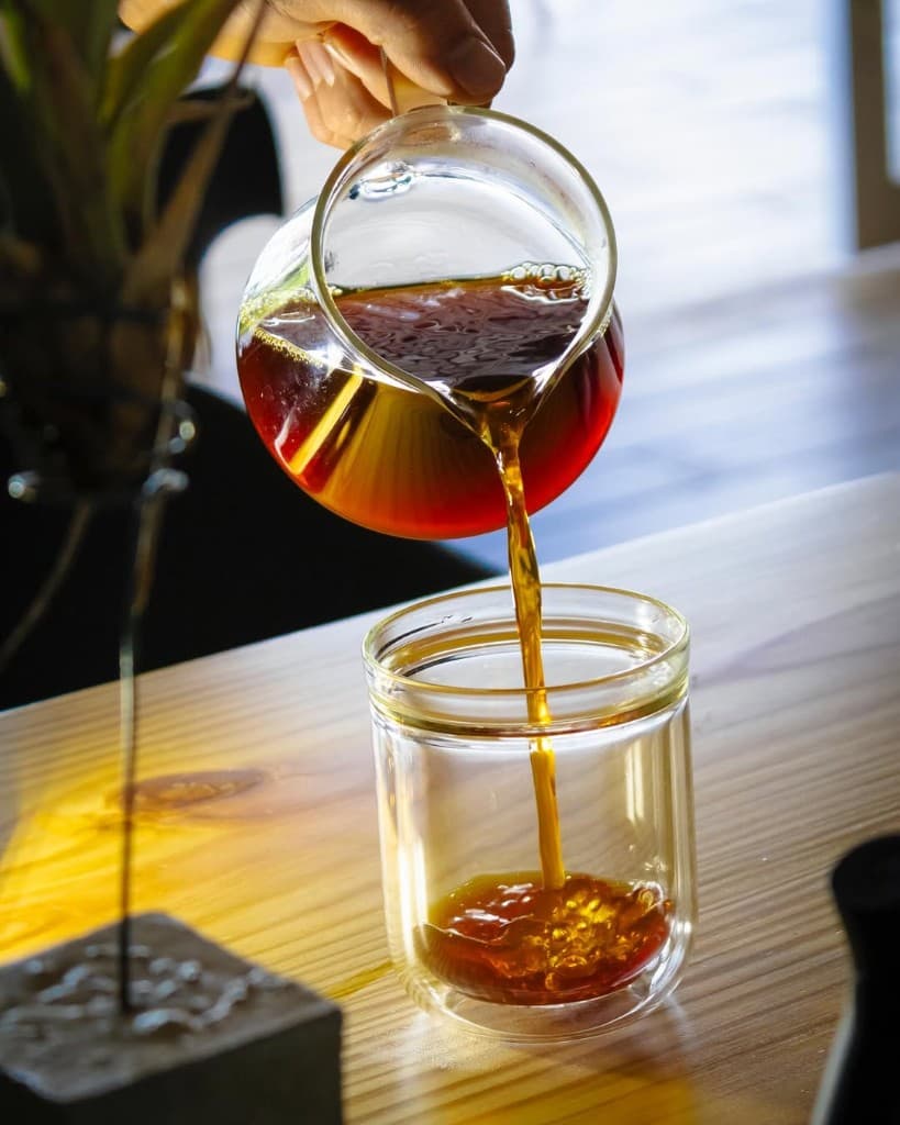 Pouring coffee into a glass